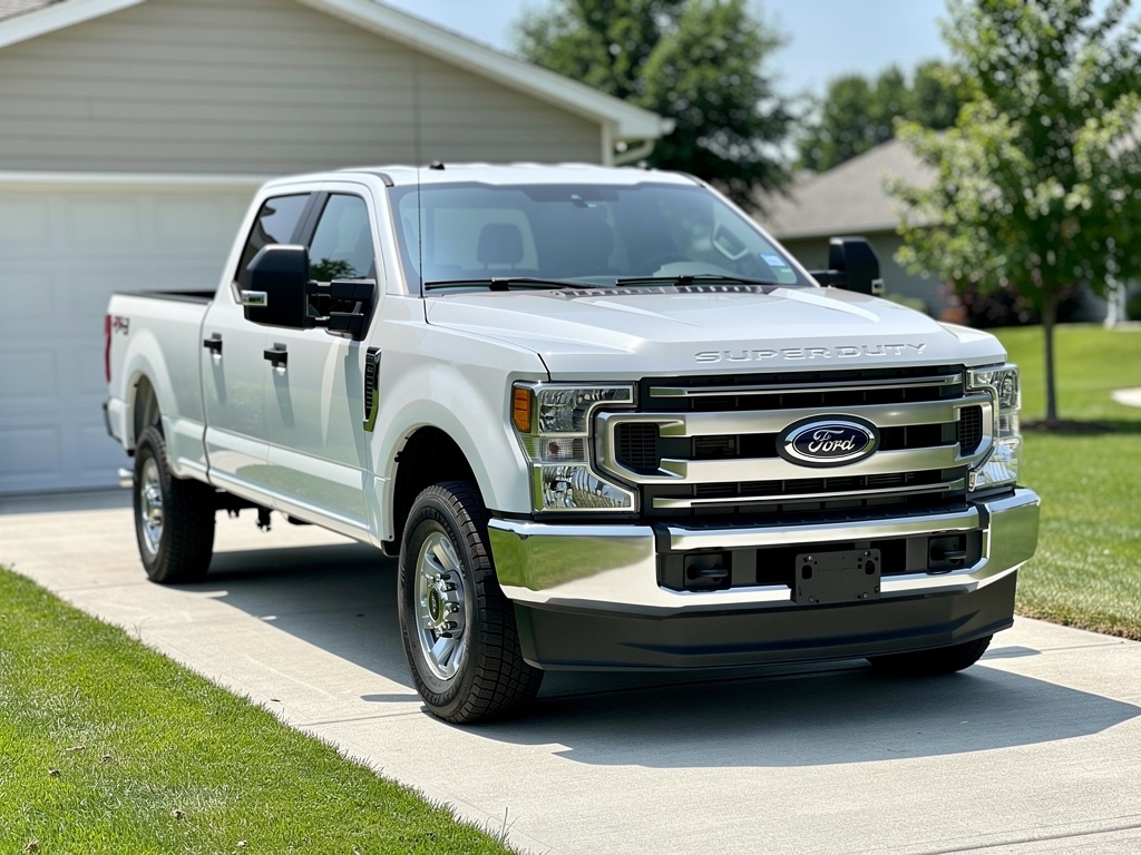 White Ford F-250 Super Duty work truck freshly detailed
