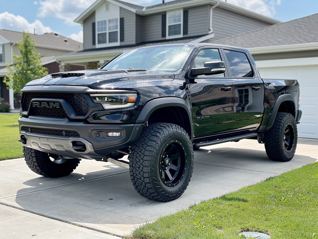Lifted black RAM 1500 TRX truck freshly detailed Long Island